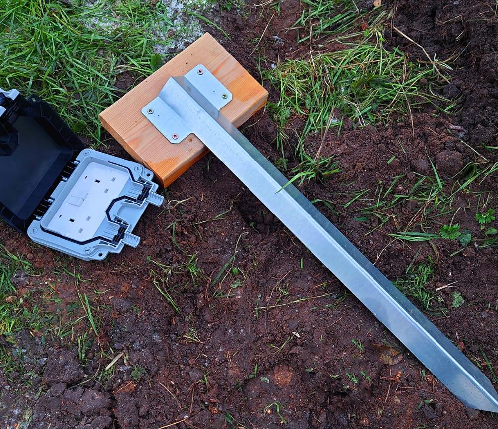 External garden socket installation London - cable route and fitting